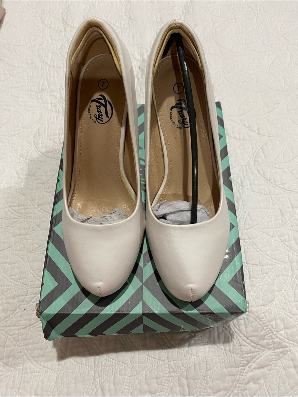 Trary Cream Round-Toe Pumps